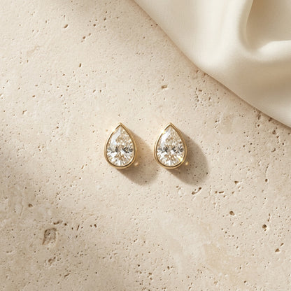 The Bezel Pear Solitaires