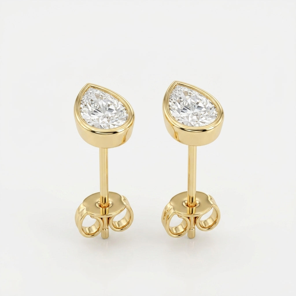 The Bezel Pear Solitaires