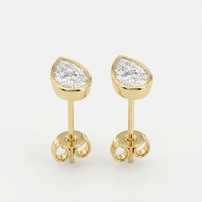 The Bezel Pear Solitaires